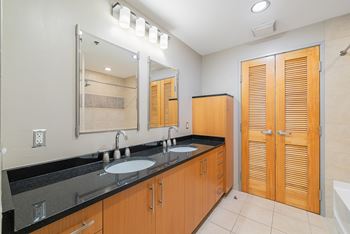 Bathroom with granite countertops*